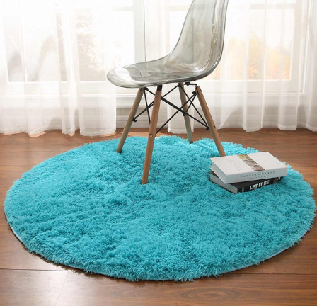 Blue fluffy round shag rug
