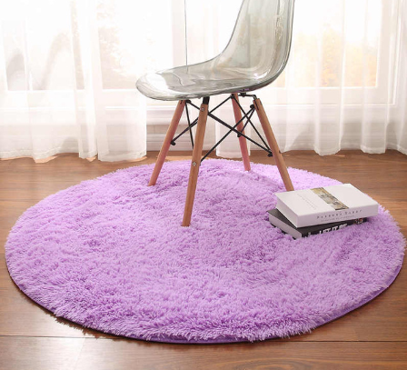 Purple fluffy round shag rug