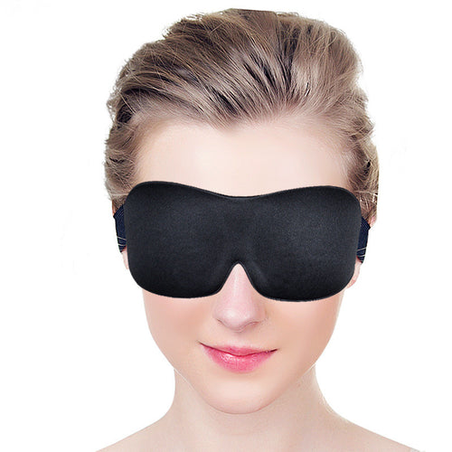 3D contoured blackout sleep mask worn by model