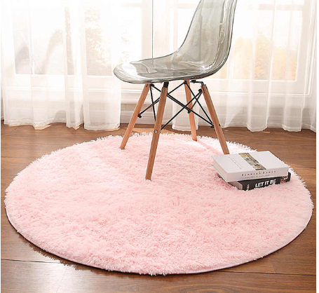 Pink fluffy round shag rug