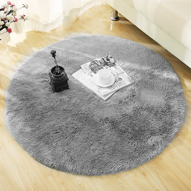 Grey fluffy round shag rug