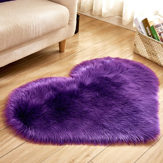 Plush heart shaped rug in violet