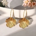 Gold plated floral petal hoop earrings